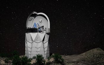 large scientific instrument on a mountain landscape under a starry night